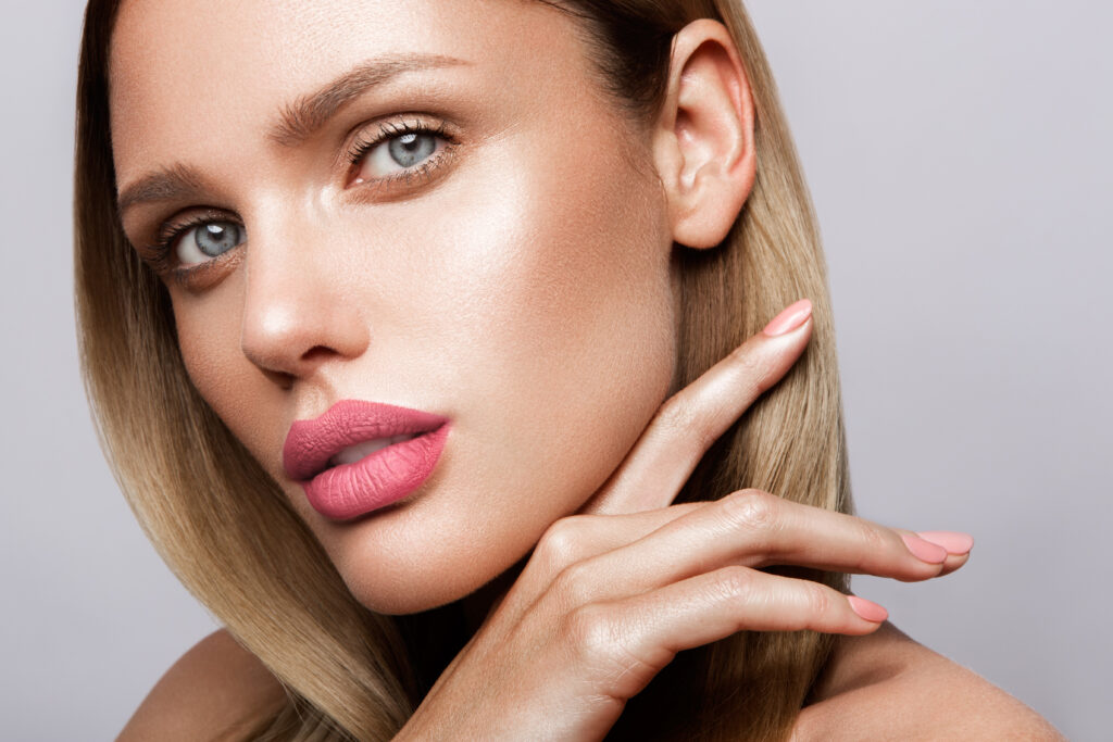 beautiful-young-model-with-pink-lips-nude-manicur-2023-11-27