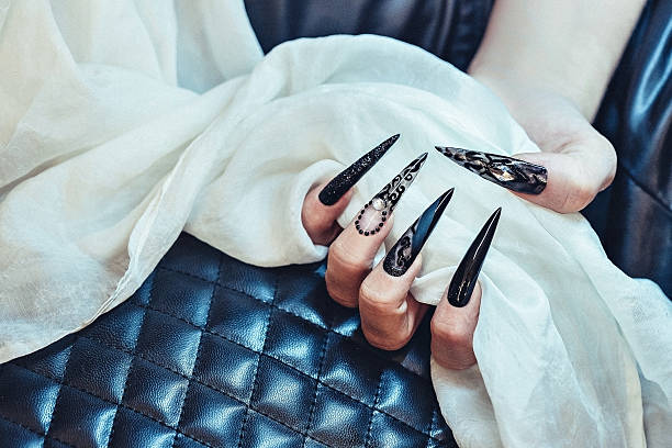 woman hand with stiletto nails