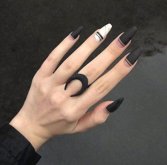 Woman's nails with a black touch