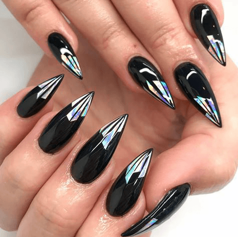 A black glass nail with a distinctive tip for a nail-savvy woman.