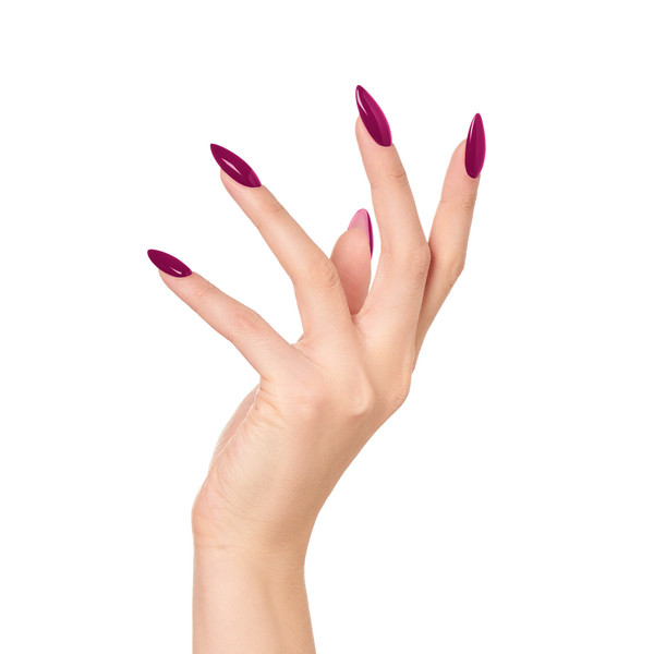 A woman's hand with color-changing nail polish on a white background.