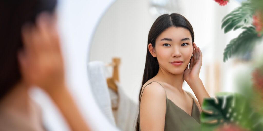 woman-looking-at-mirror-2023-11-27