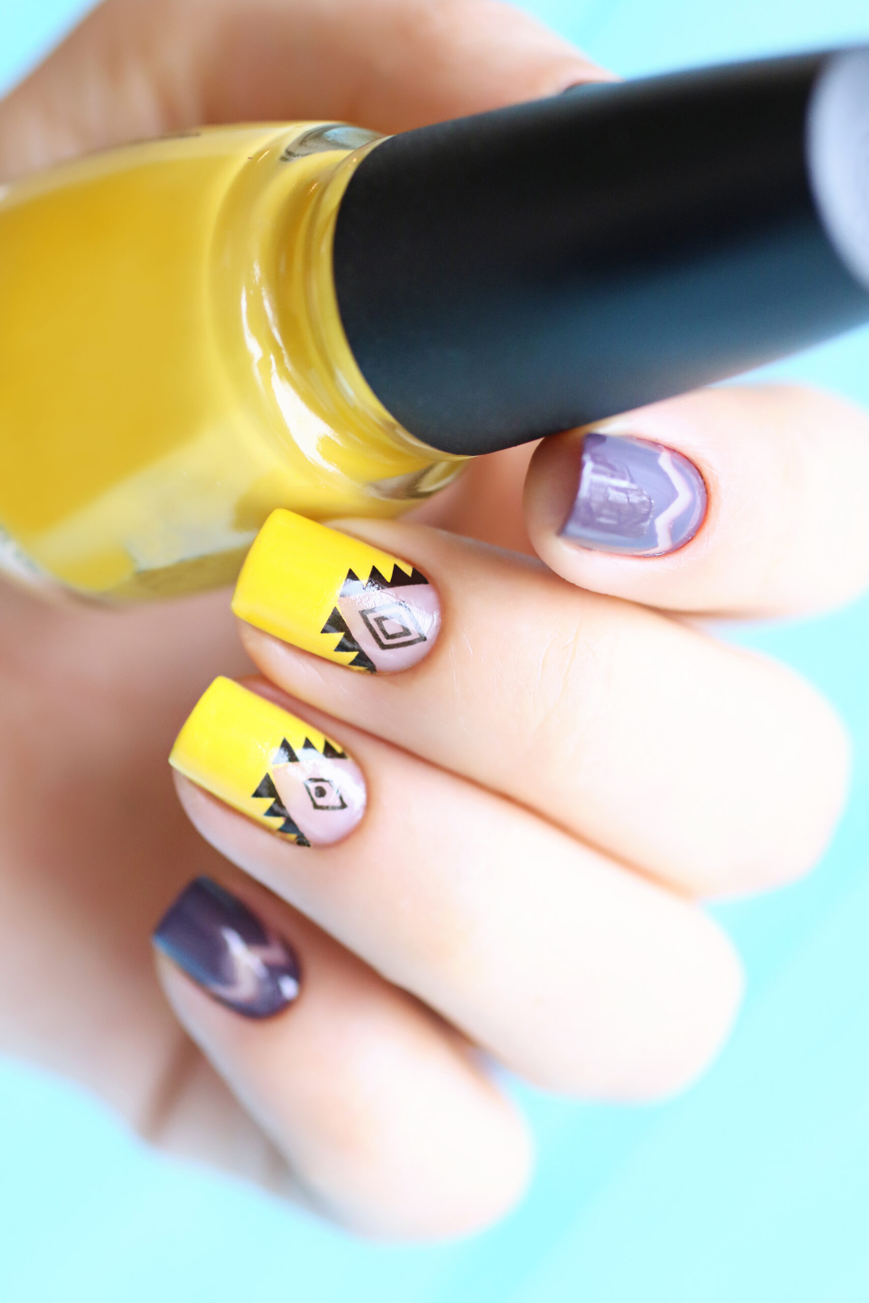 bright-yellow-and-purple-woman-manicure-with-nil-a-2023-03-28