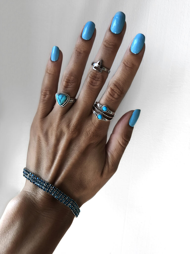 female-hand-with-manicure-gradient-nails-blue-with-2023-07-26