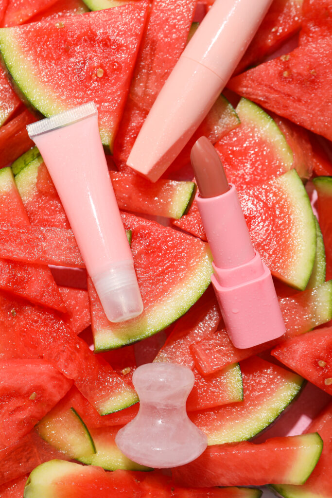 Concept of cosmetic and beauty procedures, watermelon cosmetic. Lip products