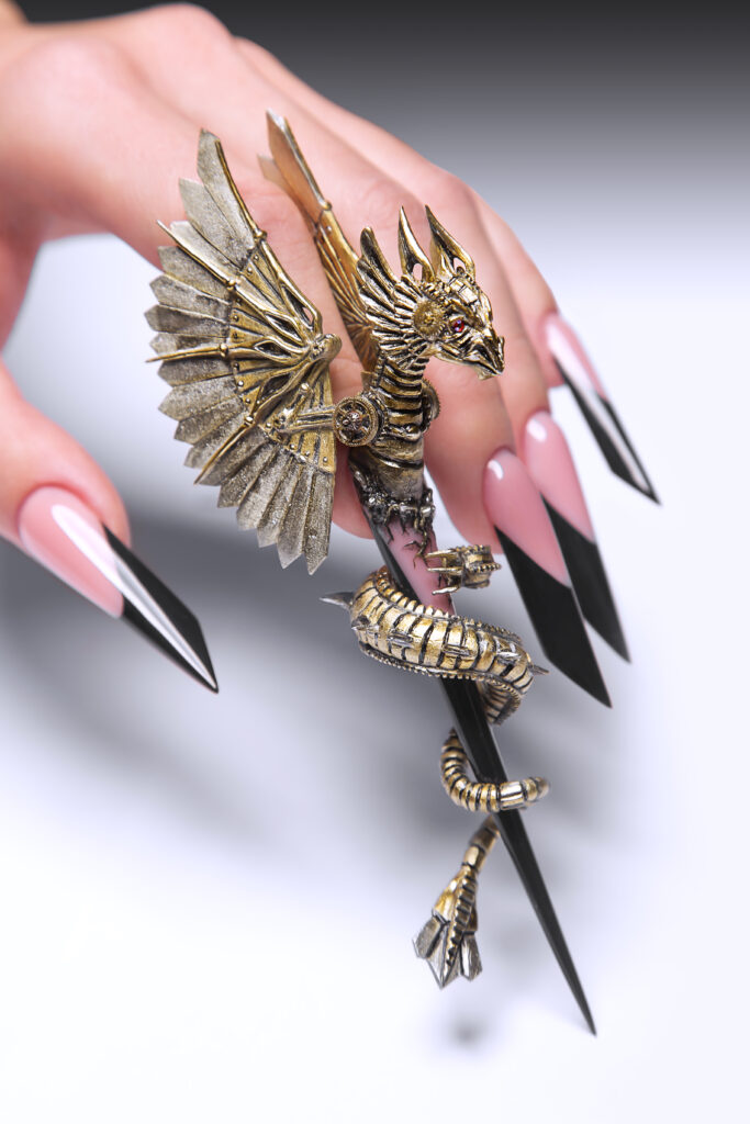 Creative design of nails on female hands. Art manicure. Photo taken in studio. 2024 nail trends