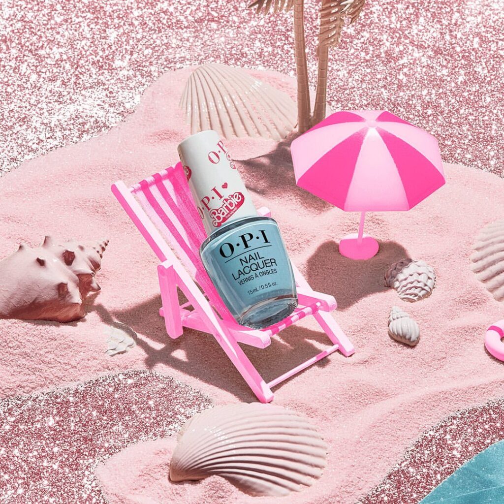 A beach-off in My Job Is Beach, a mid-tone blue crème that is literally so beach. OPI Nail Polish shade. OPI Nail Lacquer formula