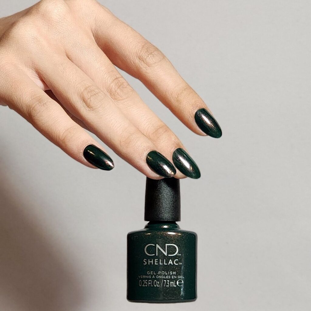 Sparkle like a Christmas tree with CND new shade, For ever green, a deep forest green dusted with pink-red shimmer.  #CND Magical Botany . 