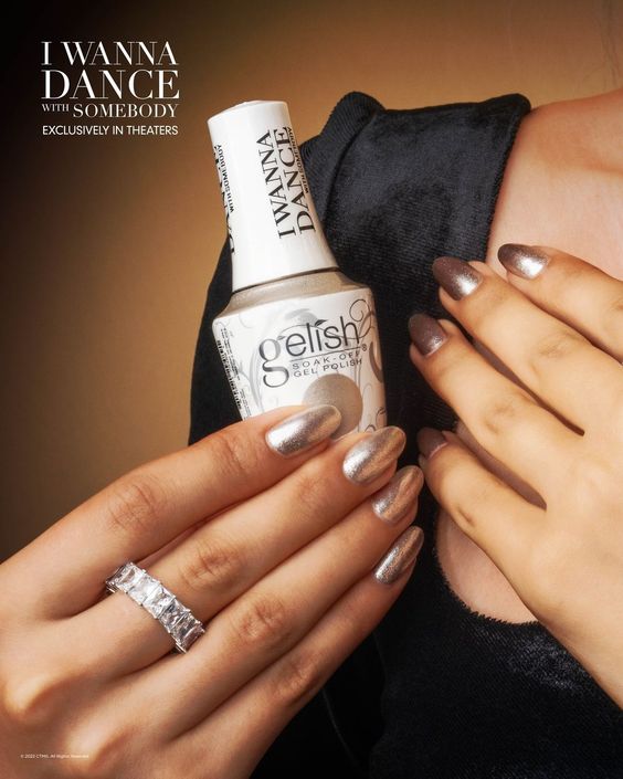 A faceless woman holding a bottle for Harmony Gelish shade from I Wanna Dance With Somebody Collection