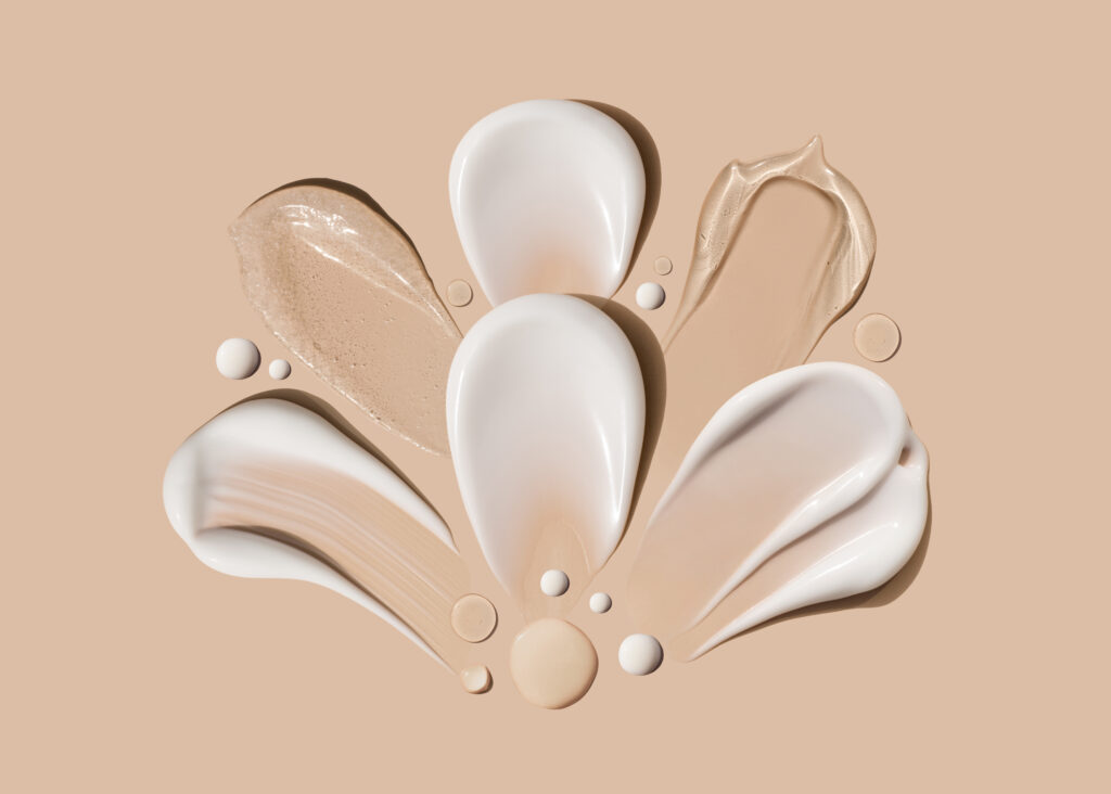 Combining BB cream and sunscreen. composition of brush strokes of creamy textures.