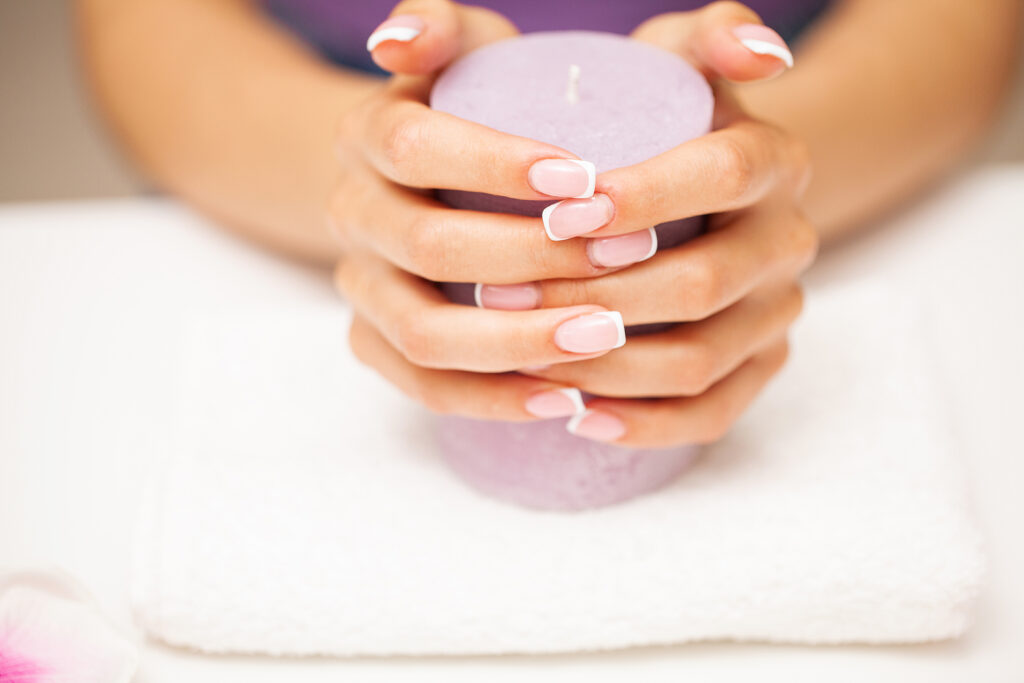 The picture of female hands with perfectly done manicure