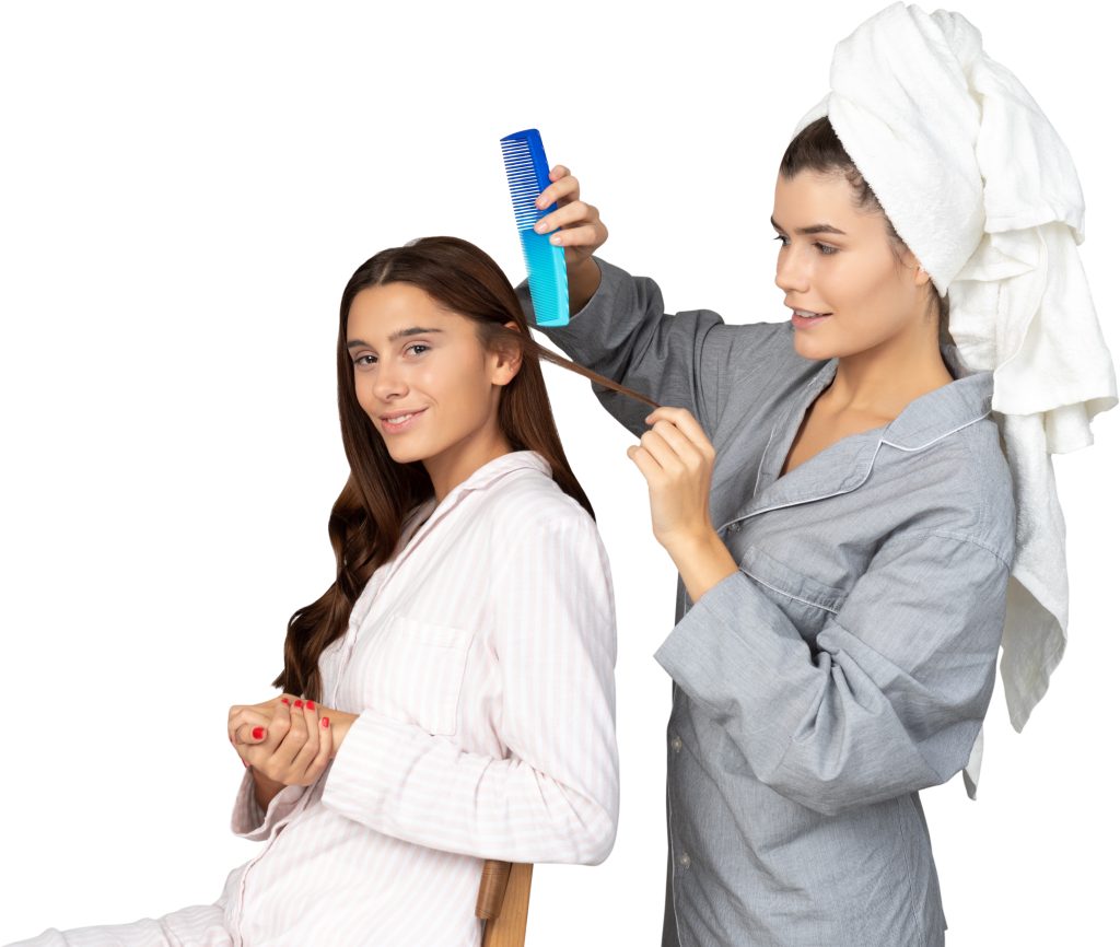 all-day care. two women wearing towels and brushing their hair