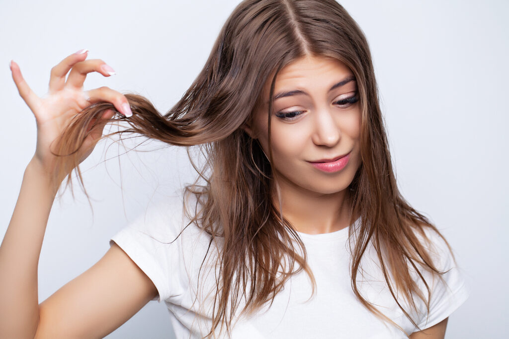 Young woman with wet hair after taking a shower. hair treatments. hair care. home hair care. diy hair care