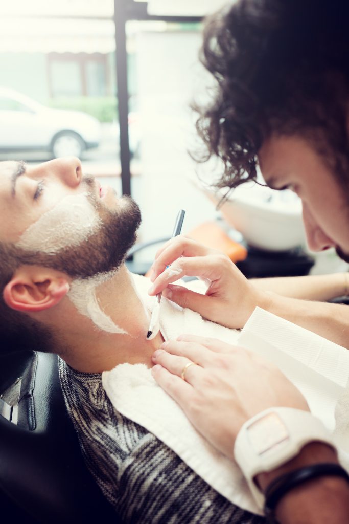 Traditional ritual of shaving the beard in a old style barber shop. Step 7: Maintaining Beard Health.