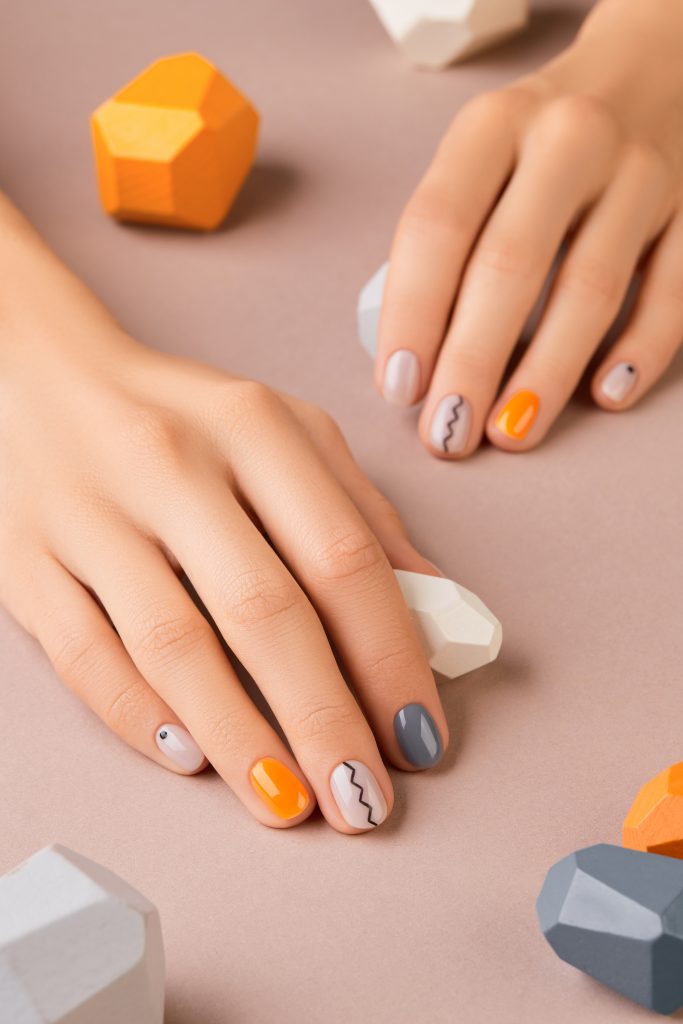 Manicured womans hands close up on beige background. Minimal spring autumn nail design. Beauty treatment body care concept. Nail Shapes and Lengths - Find Your Perfect Style.