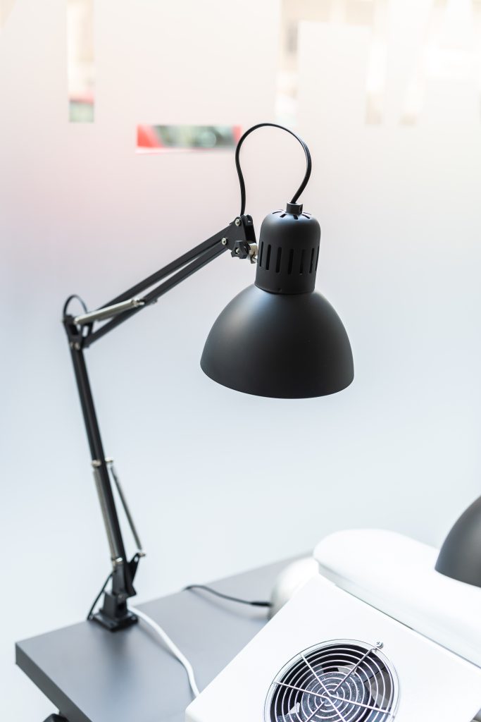 Vintage black desk lamp. Nail Care Technology. .