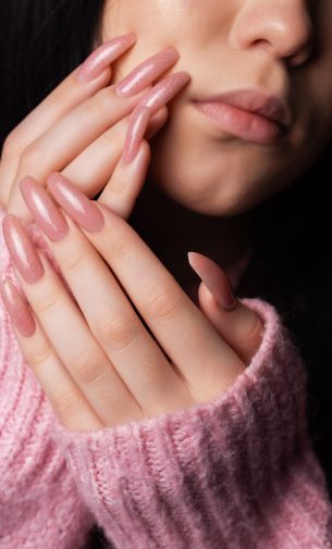 Beautiful Young Woman with manicure