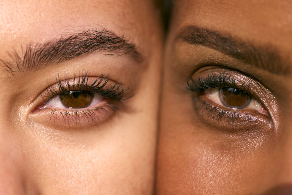 Banish Dark Circles for Good With Easy Steps!. Close Up Portrait Showing Eyes Of Mature Mother With Teenage Daughter Face To Face