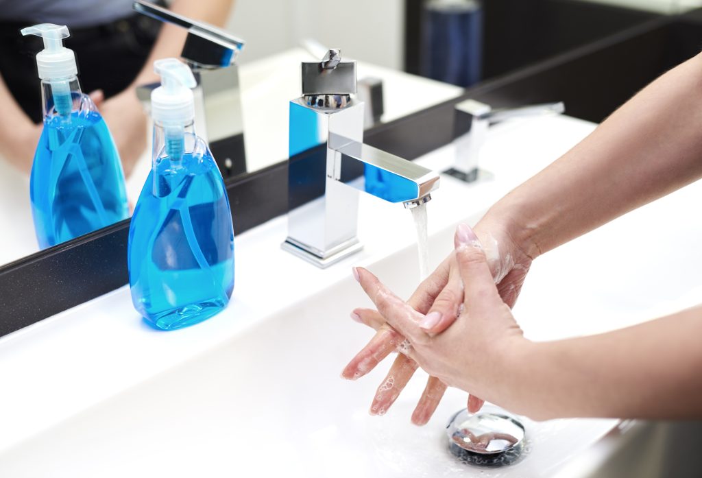 Washing hands in the bathroom