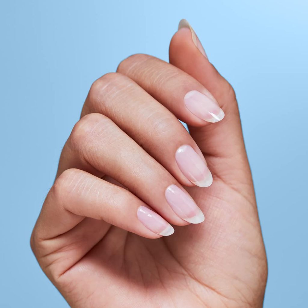 OPI 3-in-1 Treatment, Start To Finish. A faceless woman showing her nail after applying OPI 3-in-1 Treatment, Start To Finish.
