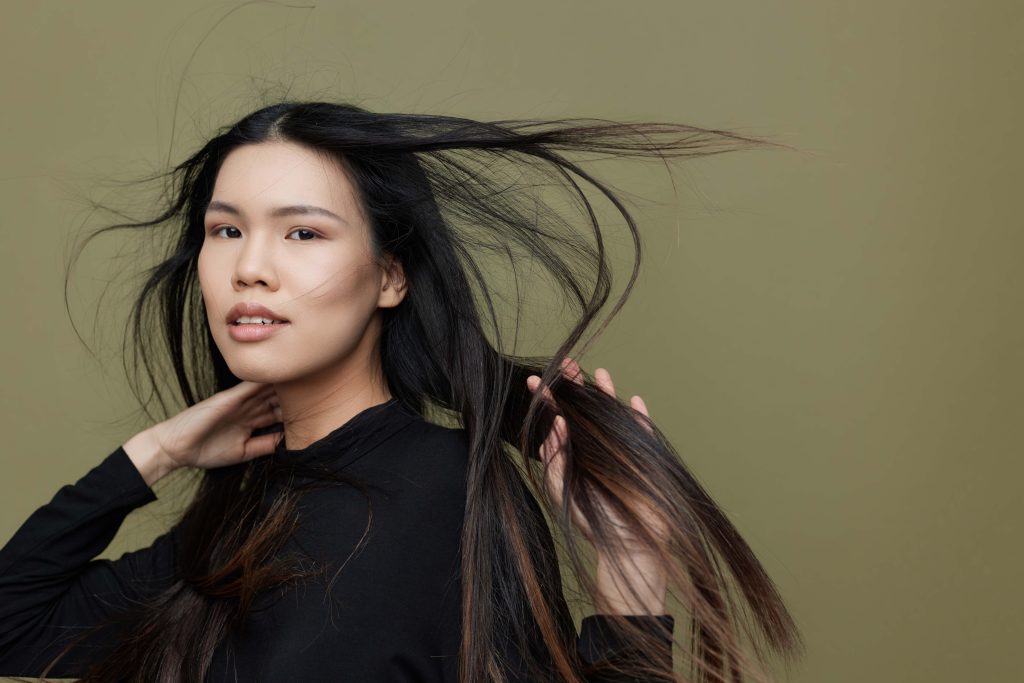 Elegance woman asian face cute skin japanese hair salon girl black long hair portrait fashion model attractive korean beautiful glamour femininity hair beauty cosmetic makeup