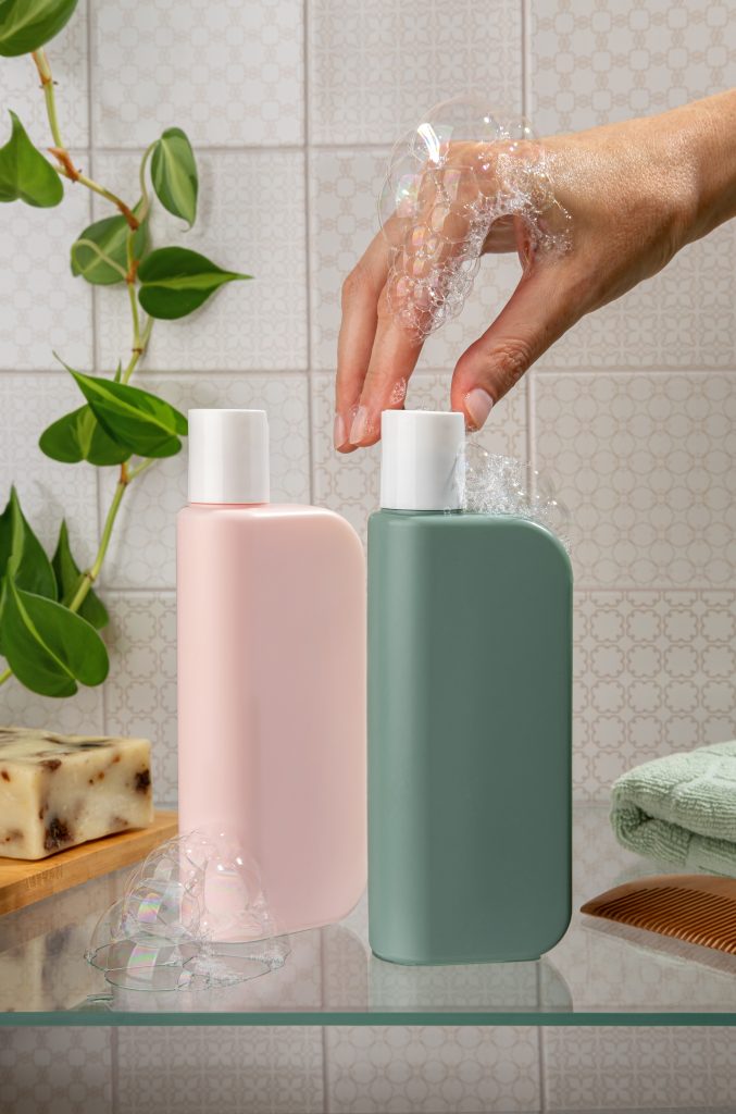 Body Shower Gel bottle packaging bottles in a modern bathroom. Set of accessories for hygiene. Natural organic spa cosmetic concept, minimalism brand packaging mock up.