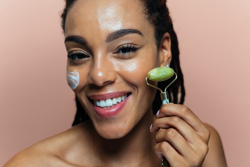 Beautiful woman making skin and facial beauty treatments. Studio shot with focus on cosmetic and skin care concepts. Skin Barrier Repair Routine.