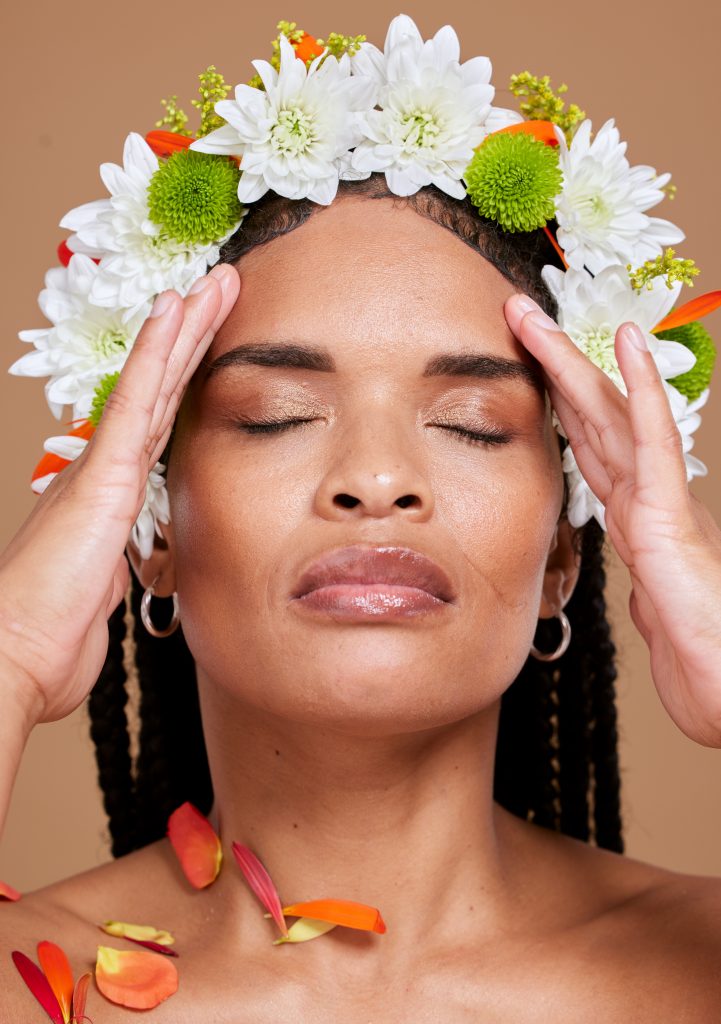 Beauty, skincare and art, woman with flowers on head in portrait with studio background. Nature, lu. Skin Barrier Repair Routine.