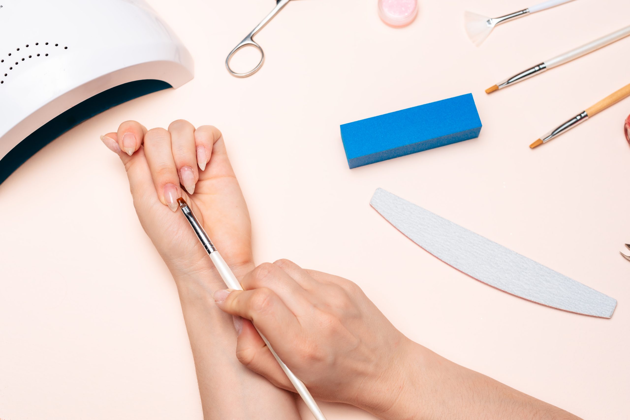 How to shape polygel nails at home using a UV lamp and professional brush for perfect 2026 polygel nail shapes.