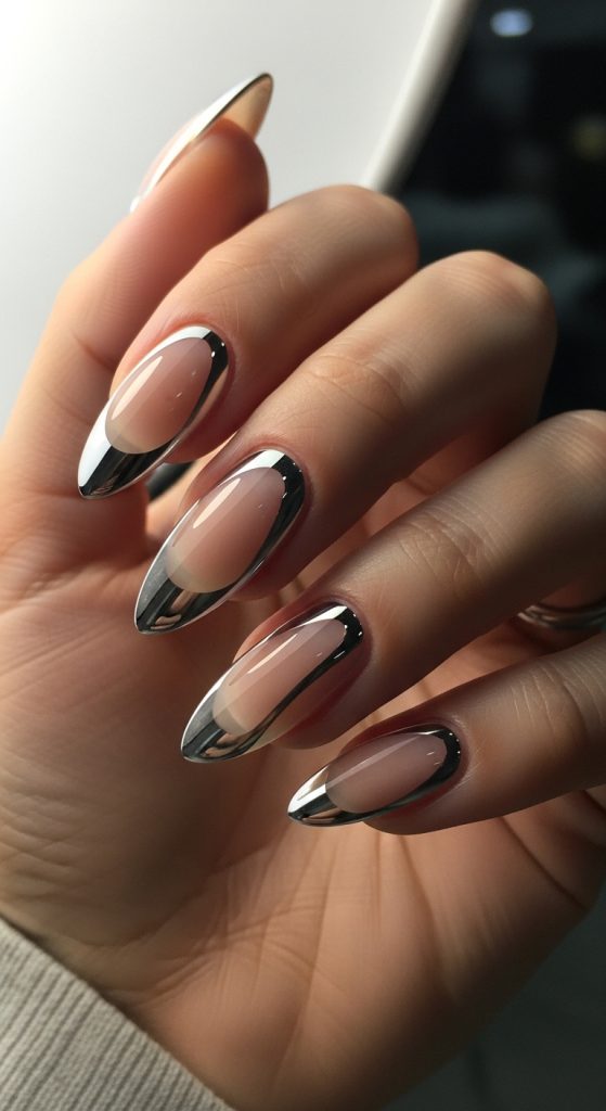Innovative multi-texture fusion nails for 2026 combining glossy, matte, and chrome finishes on elegant almond nails.