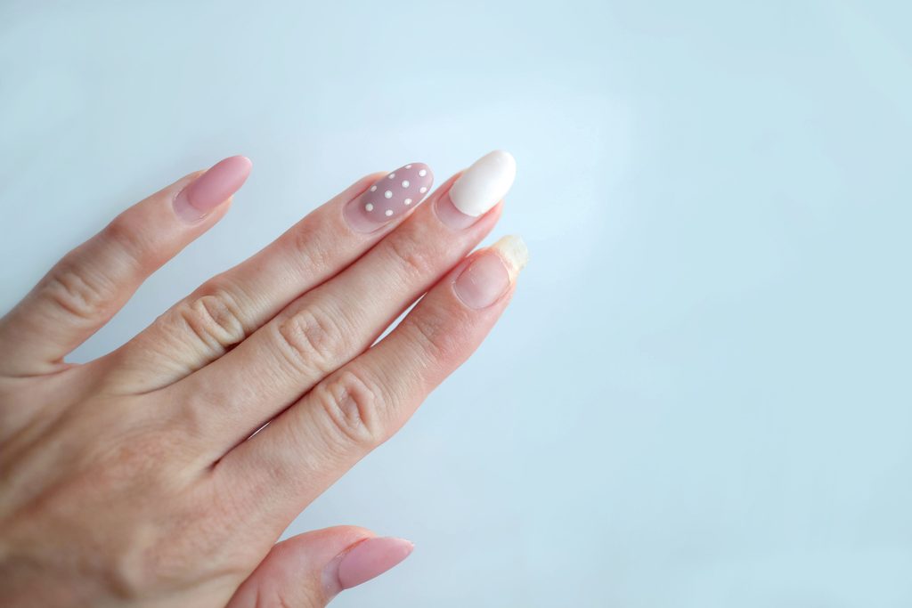Weak thin nail. Consequences of gel polish manicure. Regrown nails after shellac.